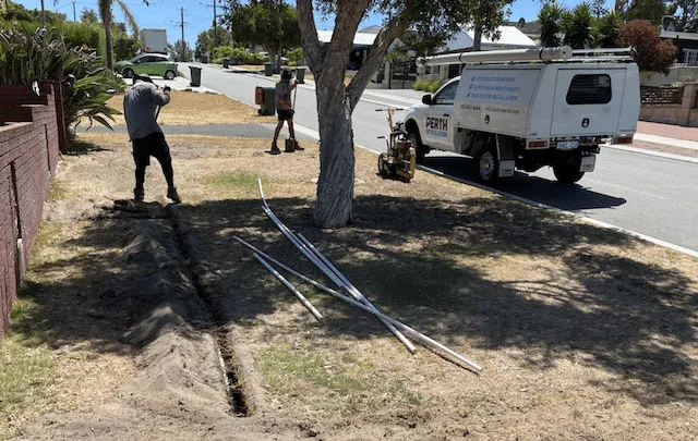 Reticulation technicians installing a new system